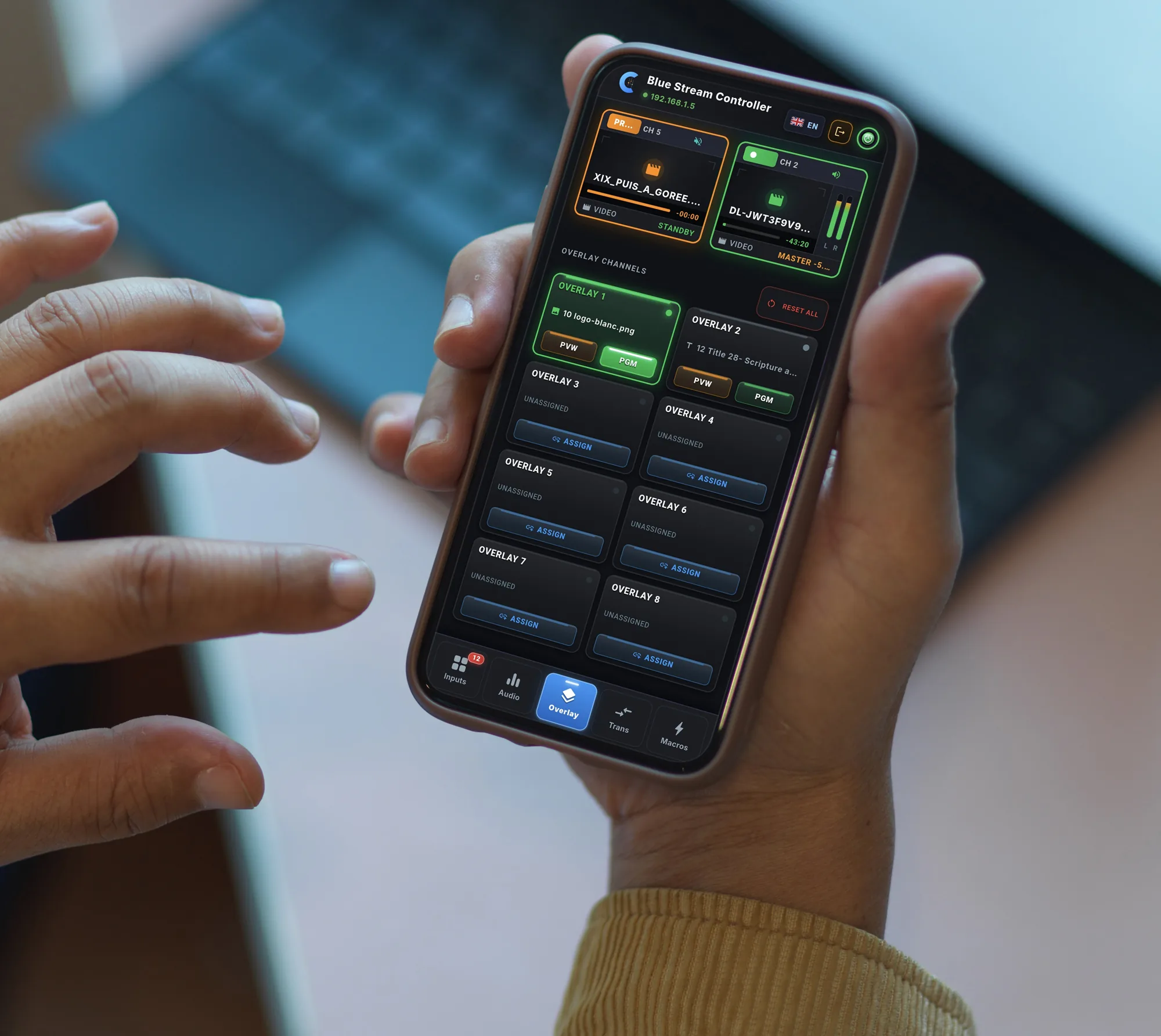 An operator controls vMix with Blue Stream Controller on their phone